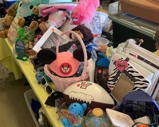 Lots and lots of kids items including Cabbage Patch dolls and books and school supplies