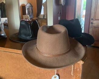 We have lots of cowboy hats and a couple pair of cowboy boots size 9 1/2 and 10