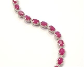 1z - 14kt White Gold Ruby & Diamond Bracelet 18 faceted rubies weighing approx 20.10 carats, 252 faceted round diamonds weighing approx 3.16 carats. Measures 7" and is finished with a tension lock clasp & safety clasp