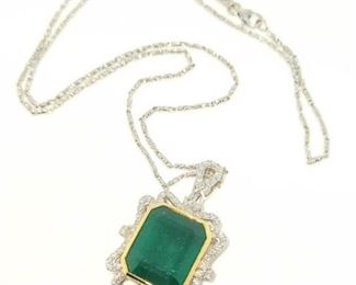 12z - 18kt Emerald & Diamond Pendant w/ 18kt link chain Oscar Friedman designer pendant mounted w/ genuine emerald center stone weighing approx 12.36 carat, 66 genuine round diamonds weighing approx .83 carats. Pendant hangs from an 18k white gold 18" link chain.