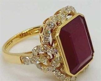 24z - 14kt Yellow Gold Diamond & Ruby Ring Size 6.5 Center Natural Ruby Composite set in Bezel Setting weight 16.47 cts Natural Diamonds round Brilliant cut weight 1.47 cts
