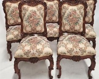 49a - Matching set of 5 heavily carved chairs
