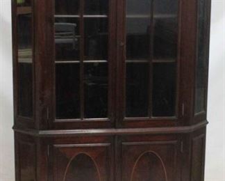 419 - Lovely mahogany 2 door corner cabinet Broken arch top, shell finial Oval inlaid blind doors at bottom key in door 76 1/2 x 42 x 32