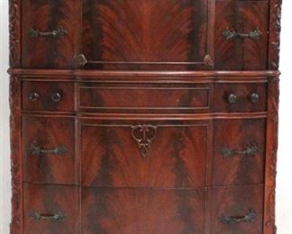 819 - Carved flaming mahogany serpentine front chest 55 x 37 1/2 x 22 Front left foot has molding loss some wear and scratches
