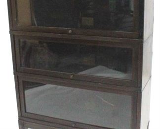 828 - Globe Wernicke carved mahogany 3 stack bookcase 55 1/2 x 11 x 34 1/2 shows scratches & wear