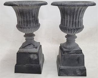 1452 - Matching pair cast iron urns on bases 26 1/2 x 15 diameter