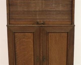 5406 - Original finish vintage oak roll front cabinet 55 1/2 x 30 x 14 1/2
