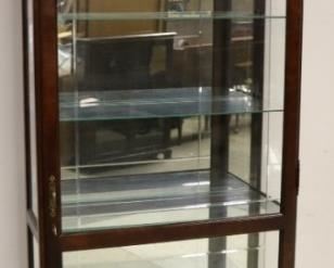6066 - Howard Miller curio cabinet 88 x 32 x 12 1/2
