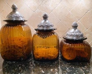 Amber glass canisters with pewter lids