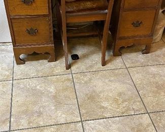 Really cool typewriter and desk with the typewriter surface that recesses down into the drsk