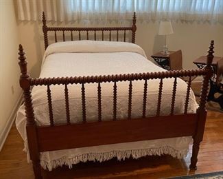 Jenny Lind spool style full bed. Oriental style rug. Chenille bedspread 