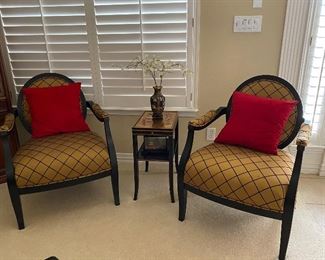 Two chairs with extra matching fabric. Small Asian influenced end table.
