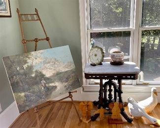 Eastlake marble top table, Victorian easel, large picture oil on canvas, wood angels, ceramic ducks...
