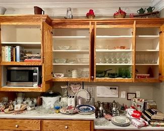 Cookbooks, microwave, teaser, glasses, green salad set, crockpot, baking dishes, pewter teaser, Silver-plated coffee/tea set, Christmas decor