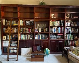 Bookcases full of great classics, vintage books,  children's books,  Reader's Digest, coffee table books, encyclopedias, dictionary's, Bibles, Underwriters  Laboratories Portable lamp  globe...