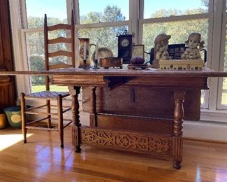 Oak Misson style drip leaf table, ladder-back chair 