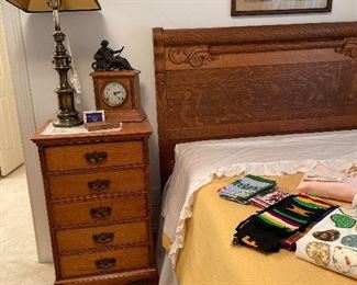 5 drawer oak chest, lamp, Sessions Clock Co. with reclining Grecian Lady, original watercolor picture over bed. 