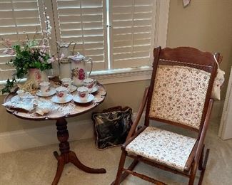 Antique wooden foldable rocker,  scalloped round top table, German hand painted chocolate set.