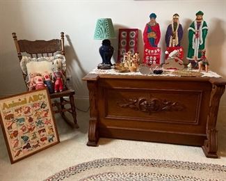 Carved rocker, lamp,  "Animal A B C's" cross stitched, 3 wooden wise men,  corn husk dolls, vintage toys cloth wolf and 3 pigs,  walnut carved chest...