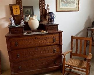 Victorian large dresser with handkerchief drawers, large ornate mirror, Ironstone pitcher, oak child's rocker, braided rug. 