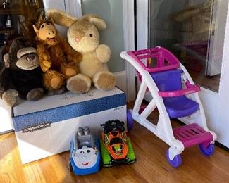 Stuffed animals including  Alien productions  "ALF",  doll stroller, mega block police car and  remote control car. 