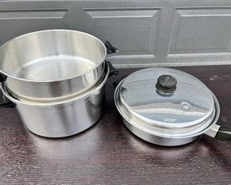 13)  $350 -  20 Piece Set of Saladmaster Cookware.  Stainless steel.  11" Stock Pot with Lid, 11" Insert, 11" Frying Pan with Lid, 9" Frying Pan with Lid, 8" Pan with Lid, 8" Insert, 8" Steamer Pan with Lid, 8" 5 qt saucepan with Lid, 8" 3 qt saucepan with Lid, 7" 1 quart with Lid, Griddle.  6 Egg cups.  All used but in good clean condition.  