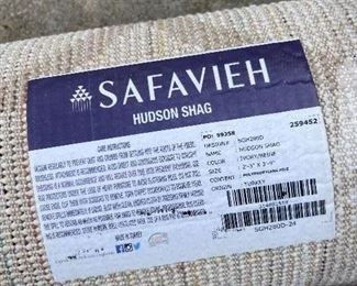 10)  $100 - Safavieh Hudson Shag  100% Polypropylene.  Made in Turkey.  Ivory/Beige.  27" x 45".  Clean with no apparent spots or stains.  