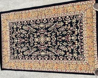 8)  $120 - Safavieh Lyndhurst Collection.  100% Polypropylene.  Made in Turkey.  Black/tan.  48" x 72".  Clean with no apparent spots or stains.  