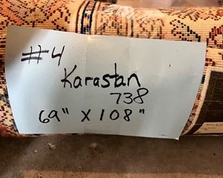 4)  $250 - Karastan 100% Wool.  Tabraz Pattern #738. Made in USA.  White.  69 x 108.  Tan with multi colors.  Clean with no apparent spots or stains.  