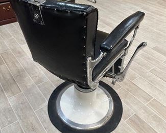 16)  $750 - Vintage Emil.J.Paidar Hydraulic Barbers Chair.  Working hydraulics, newly reupholstered seat, back and arms.  In excellent working condition.  Heavy.  Must provide moving resources.  