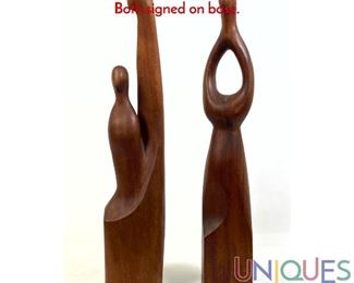 Lot 45 Pair of Danish Carved Teak Figural Sculptures. Both signed on base.