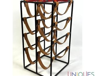 Lot 61 ARTHUR UMANOFF Black Iron and Leather Wine Rack. Leather straps. Bar Modernist.