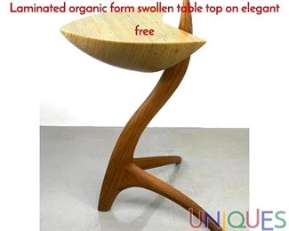 Lot 68 CRAIG SIEBENECK Artisan Studio Side Table. Laminated organic form swollen table top on elegant free