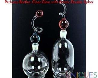 Lot 102 2pc Artist Signed Stoppered Art Glass Studio Perfume Bottles. Clear Glass with Artistic Double Spher