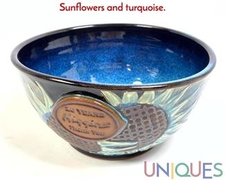 Lot 108 Philips pottery Higgins 20 year bowl. Sunflowers and turquoise.