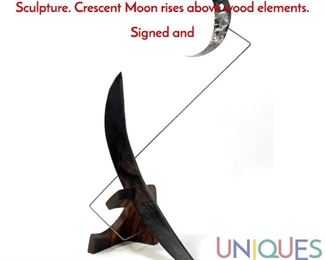 Lot 114 ADAM HENDERSON Modernist Mixed Media Sculpture. Crescent Moon rises above wood elements. Signed and