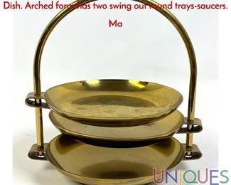 Lot 132 TOMMI PARZINGER Brass Three Part Serving Dish. Arched form has two swing out round trayssaucers. Ma