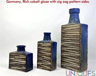Lot 140 Set 3 Graduated Size Studio Pottery Vases. W. Germany. Rich cobalt glaze with zig zag pattern sides.