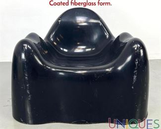 Lot 193 WENDELL CASTLE Molar Lounge Chair. Black Coated fiberglass form.