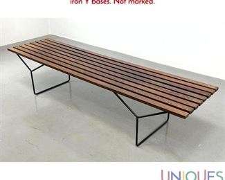 Lot 208 Harry Bertoia style Slat Bench. Dark stained slats on black iron Y bases. Not marked.