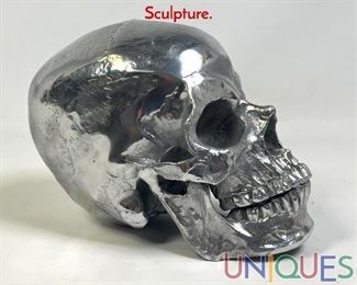 Lot 236 Silvered Aluminum Human Skull form Sculpture.