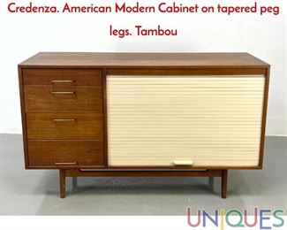 Lot 239 JENS RISOM Walnut Tambour Door Cabinet Credenza. American Modern Cabinet on tapered peg legs. Tambou