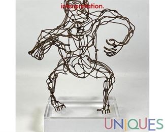 Lot 259 Wire Gorilla sculpture on Lucite base. Clever interpretation.