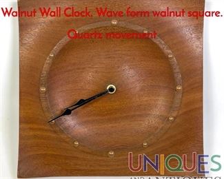 Lot 275 Stylish Studio Carved Modern Walnut Wall Clock. Wave form walnut square. Quartz movement