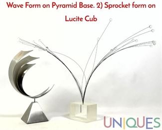 Lot 288 2pc Modernist Sculptures. 1 Steel Layered Wave Form on Pyramid Base. 2 Sprocket form on Lucite Cub