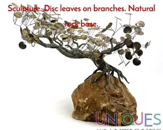 Lot 294 C Jere attributed Metal Bonsai Tree Sculpture. Disc leaves on branches. Natural rock base.