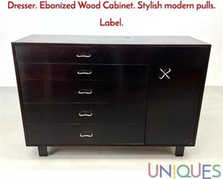 Lot 323 GEORGE NELSON for HERMAN MILLER Dresser. Ebonized Wood Cabinet. Stylish modern pulls. Label.