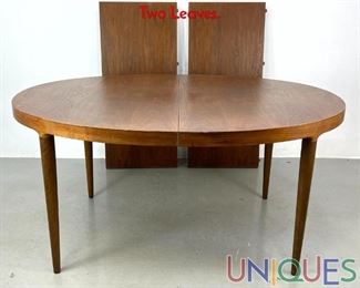 Lot 335 Danish Modern Teak Oval Dining Table. Two Leaves.