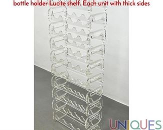 Lot 369 Stackable Lucite Wine Racks. Interchangeable bottle holder Lucite shelf. Each unit with thick sides