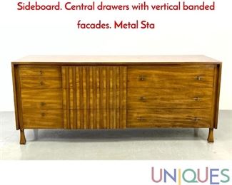 Lot 371 JOHN WIDDICOMB Modernist Credenza Sideboard. Central drawers with vertical banded facades. Metal Sta